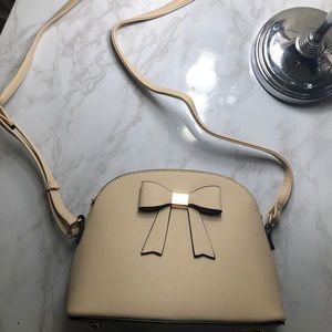 Faux leather bow crossbody purse